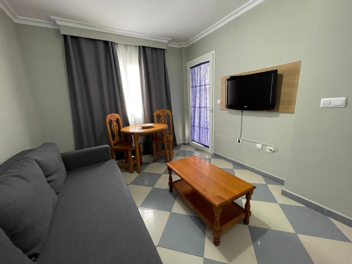 Apartamentos Nina De Oro توريمولينوس المظهر الخارجي الصورة